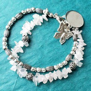 2/10$ Silver tone bracelet, quartz and butterfly charm